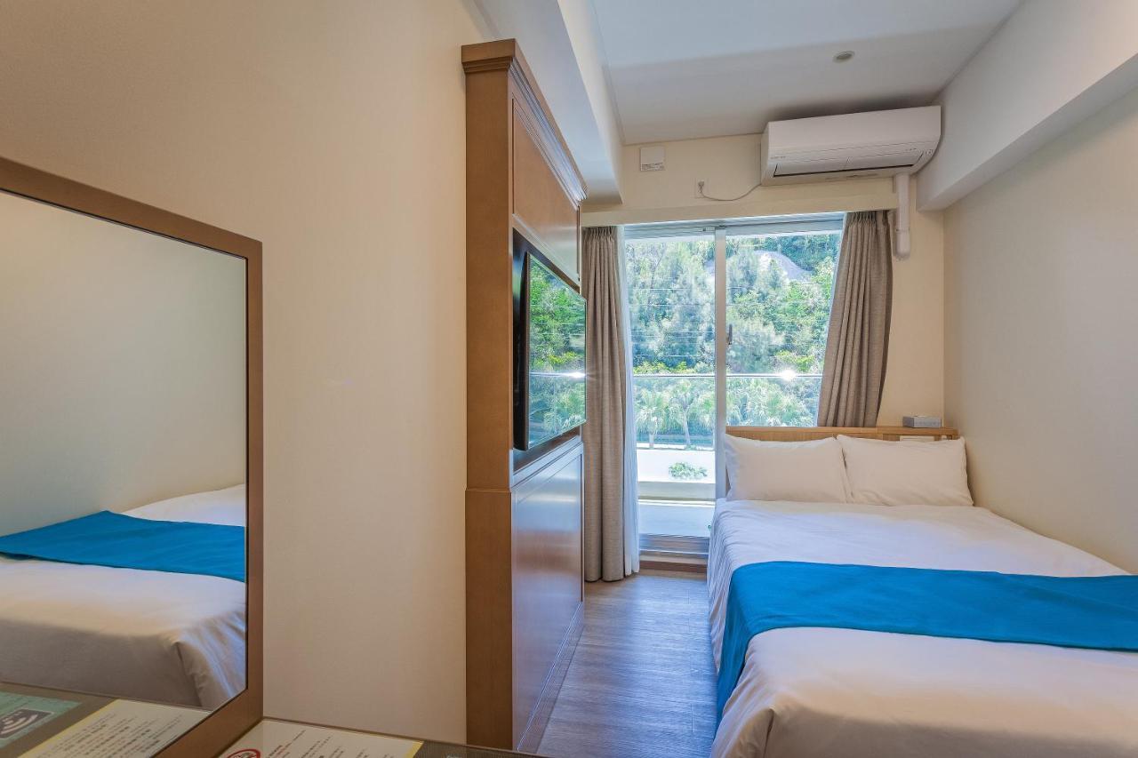 Kariyushi Lch. Resort Наго Экстерьер фото
